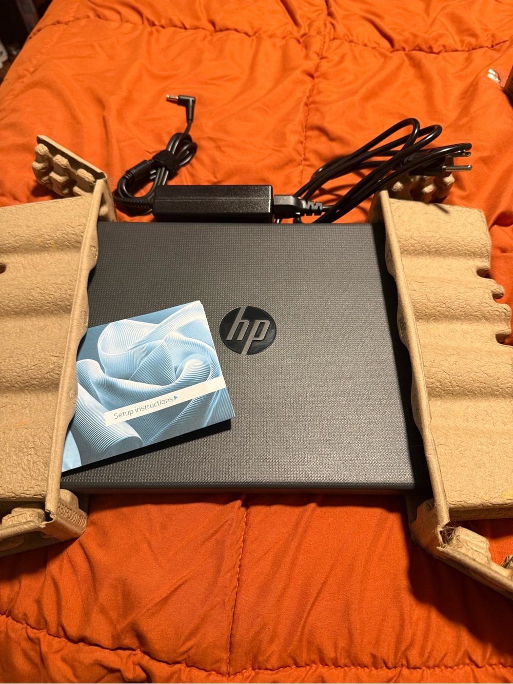 HP Laptop in Dark Gray with Charger and Setup Guide